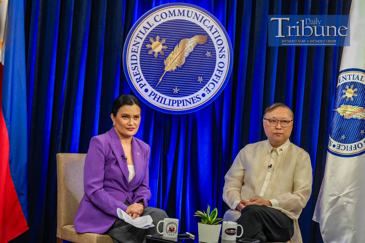 Secretary Ivan John Uy of the Department of Information and Communications Technology (right) explains the dangers of deepfake videos on the internet during the first episode of Malacanang Insider, hosted by PCO Press Briefer Daphne Osena Paez, on Monday, August 5, 2024. PHOTO BY YUMMIE DINGDING